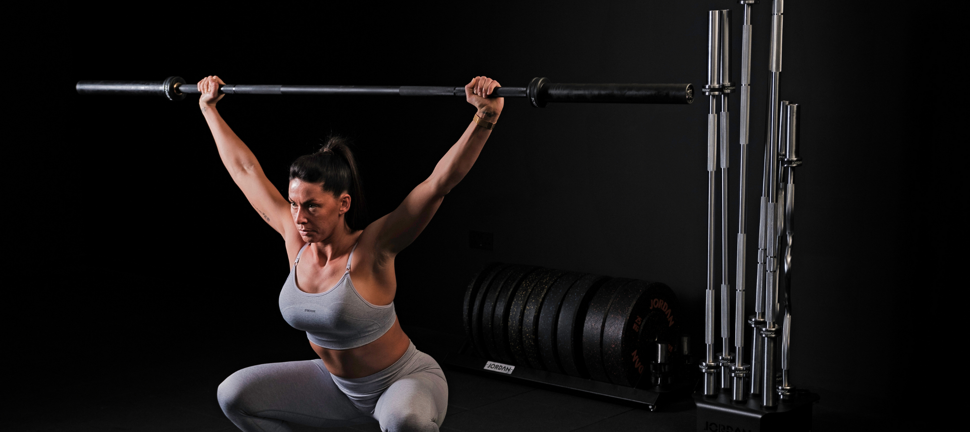 How much is an Olympic barbell weigh in kg How much is an Olympic barbell weigh in kg