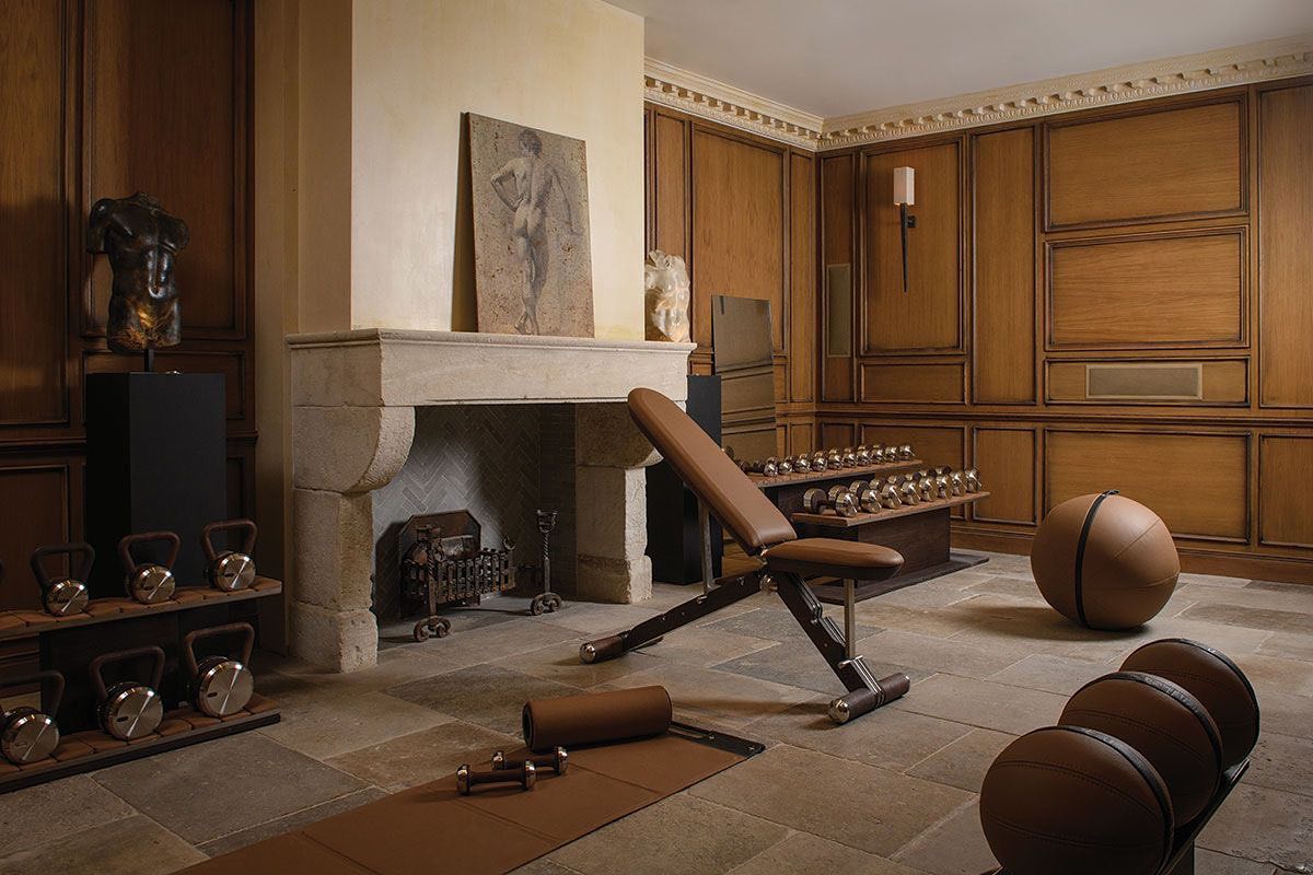 Pent. Luxury home gym in old house setting