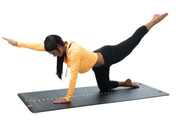 Escape Yoga Hold on mat